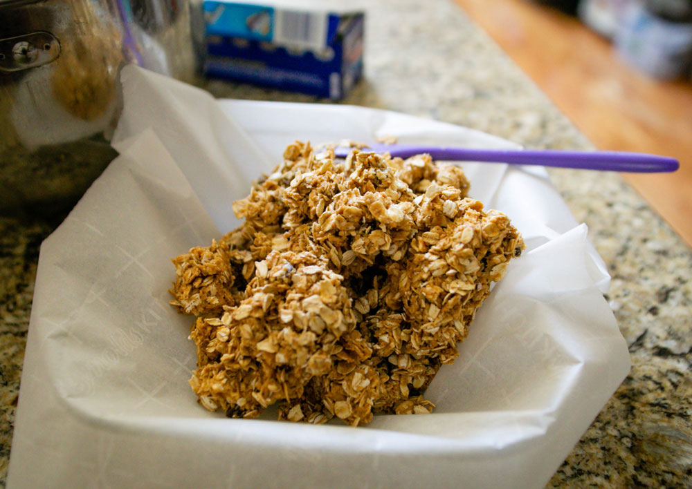 Add Granola Bar Mixture to Parchment Paper