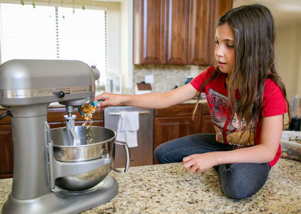 pour pretzels in mixer