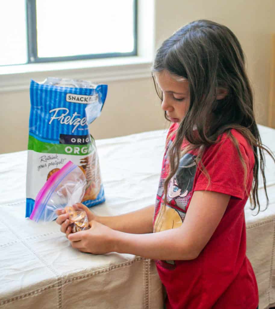 Put pretzels in ziploc bag and crush